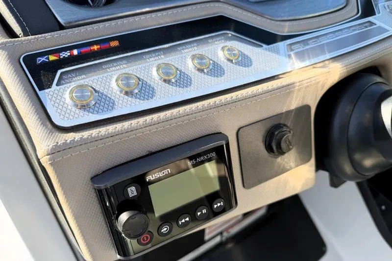 Slide: The Image of Control panel of 2022 Monterey 255SS Super Sport boat with Fusion MS-NRX300 stereo. - 26