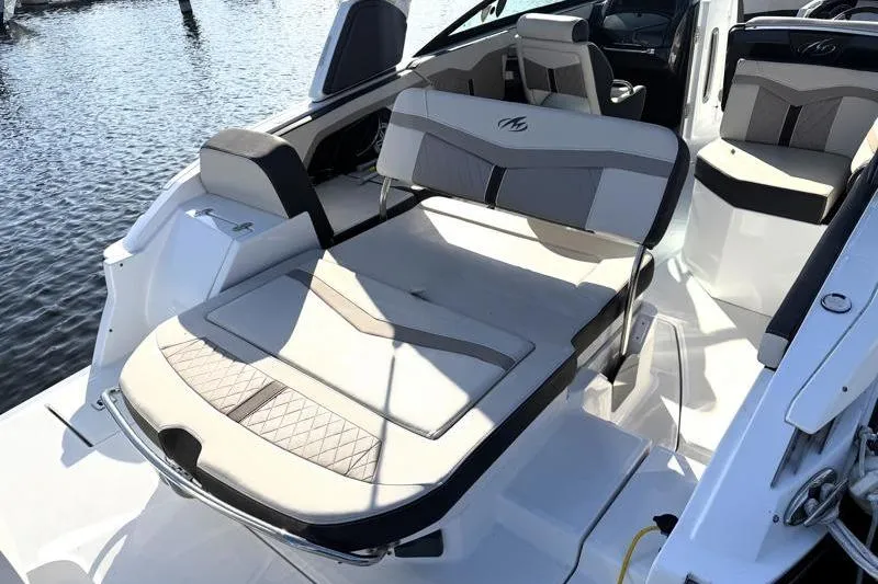Slide: The Image of 2022 Monterey 255SS Super Sport boat interior with luxurious seating on water. - 36