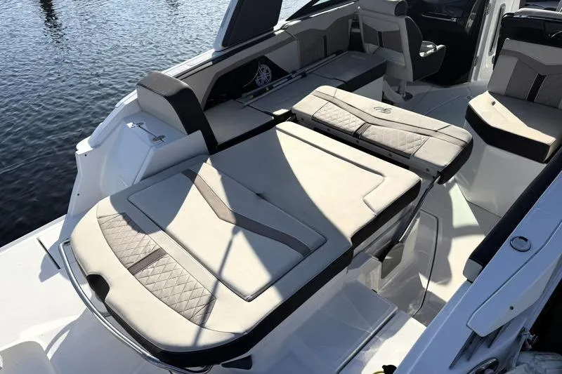 Slide: The Image of 2022 Monterey 255SS Super Sport boat interior with luxurious seating and sleek design. - 37