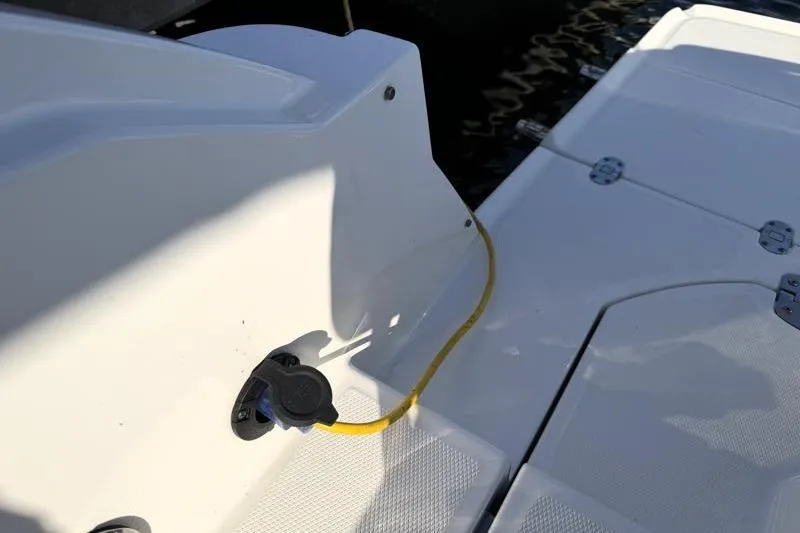 Slide: The Image of 2022 Monterey 255SS Super Sport boat with yellow power cable connection. - 42