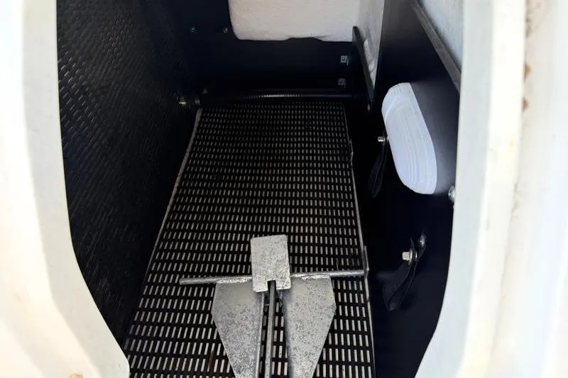 Slide: The Image of Anchor storage compartment in 2022 Monterey 255SS Super Sport boat. - 45