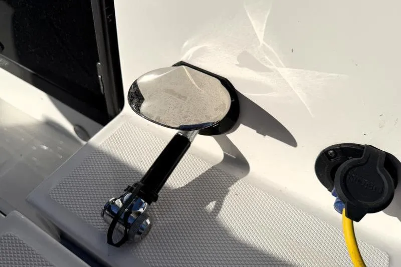 Slide: The Image of Close-up of a 2022 Monterey 255SS Super Sport boat's shower head and power outlet. - 46