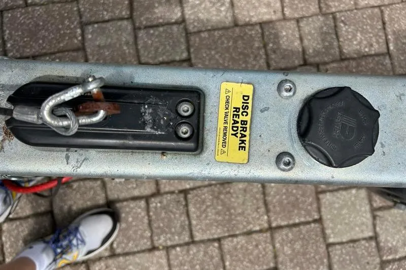 Slide: The Image of Trailer hitch with disc brake ready label, Monterey 255SS Super Sport 2022. - 55