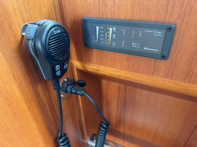 Slide: The Image of Microphone and control panel on 2009 Grand Banks 45 Eastbay SX yacht interior. - 10