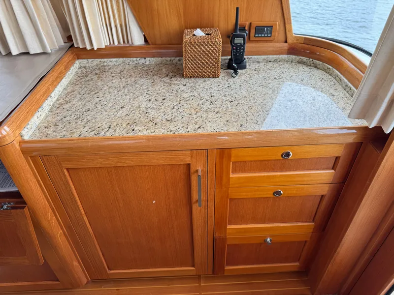Slide: The Image of Granite countertop and wooden cabinetry inside 2009 Grand Banks 45 Eastbay SX yacht. - 20