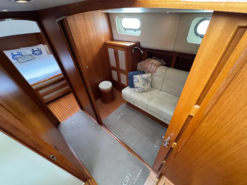 Slide: The Image of Luxurious 2009 Grand Banks 45 Eastbay SX yacht interior with cozy seating and elegant wood finish. - 32
