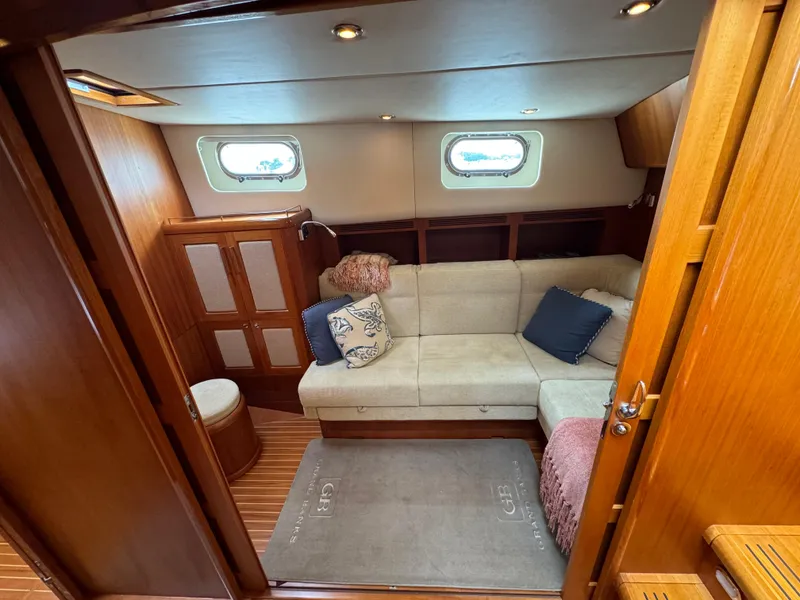 Slide: The Image of Luxurious interior of 2009 Grand Banks 45 Eastbay SX yacht with cozy seating area. - 33