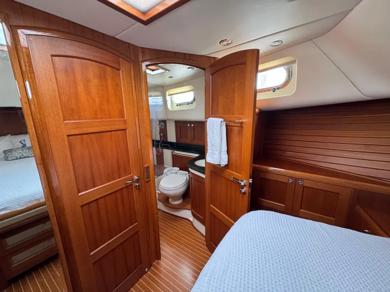Slide: The Image of Luxurious 2009 Grand Banks 45 Eastbay SX yacht interior with wood finish and cozy cabin. - 44