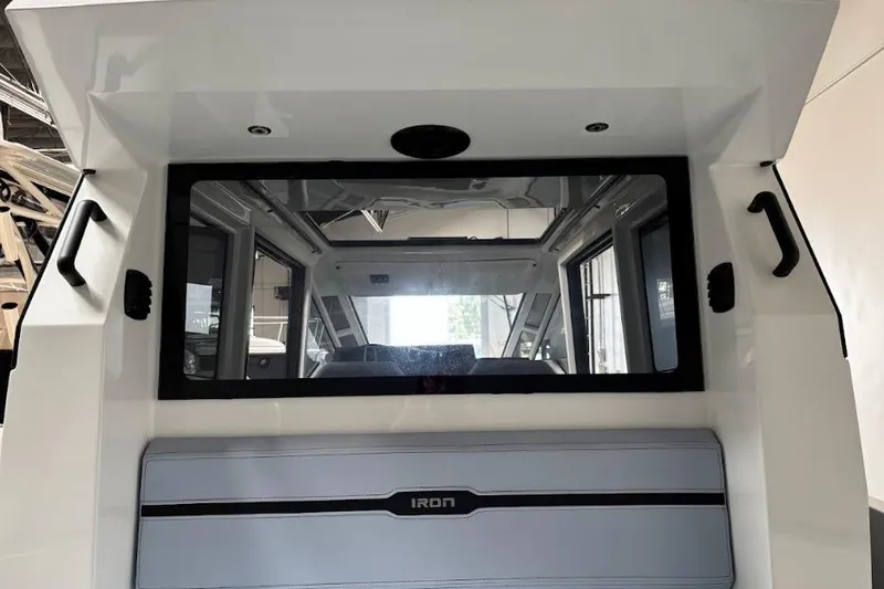 Slide: The Image of Interior view of 2026 Iron 907 Coupe with sleek design and modern features. - 13