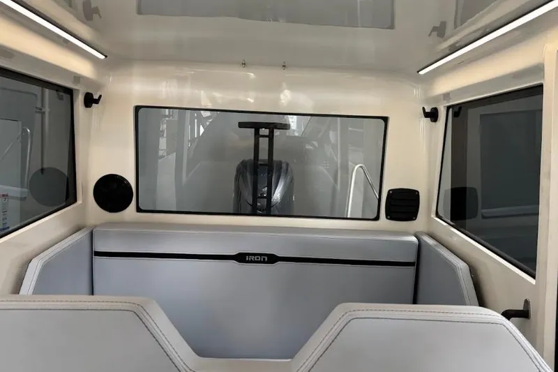 Slide: The Image of Interior of 2026 Iron 907 Coupe, featuring sleek seating and modern design elements. - 19