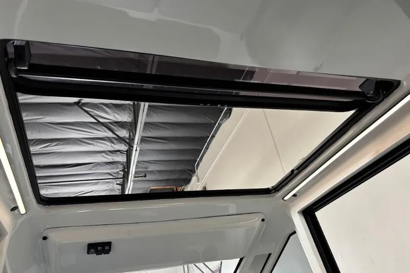 Slide: The Image of Sunroof of 2026 Iron 907 Coupe, showcasing sleek design and modern features. - 20