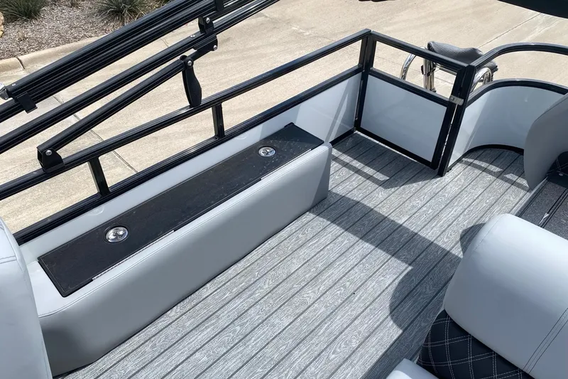 Slide: The Image of 2026 Ranger 223FC boat interior with sleek seating and modern flooring design. - 16