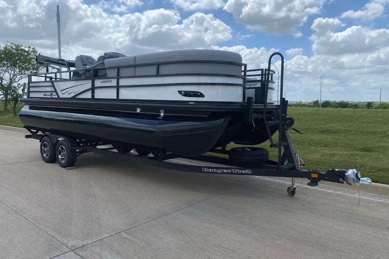 Slide: The Image of Top view of 2026 Ranger 223FC pontoon boat with spacious seating layout. - 4