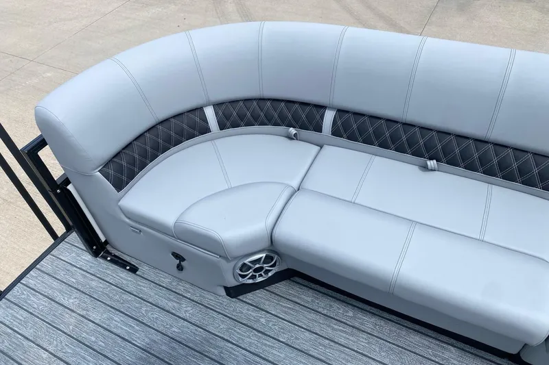 Slide: The Image of Luxurious seating on 2026 Ranger 223FC boat with elegant upholstery and speaker system. - 9