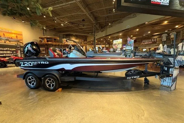 The Image of 2026 Nitro Z20 XL Pro boat displayed in a showroom with modern interior design. - 0