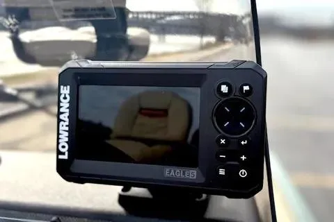 Slide: The Image of Lowrance fish finder on 2026 Tracker Bass Tracker Classic Limited boat dashboard. - 9