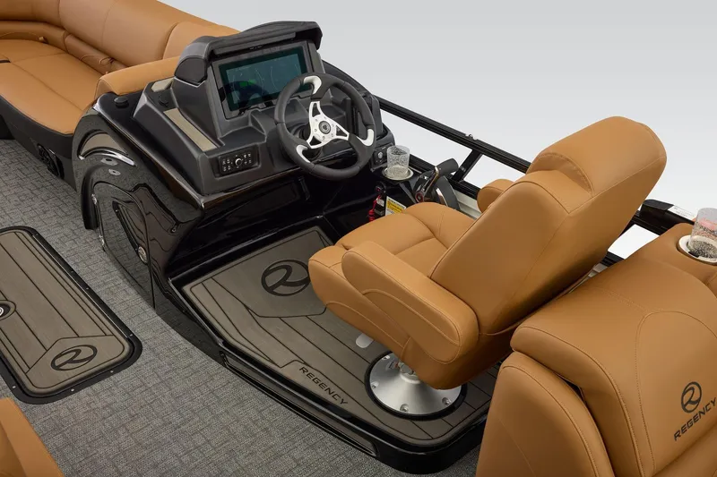 Slide: The Image of Luxurious interior of 2026 Regency 230 DL boat with tan seating and modern dashboard. - 23