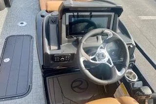 Slide: The Image of 2026 Regency 230 DL boat with rear camera detail, showcasing sleek design. - 9