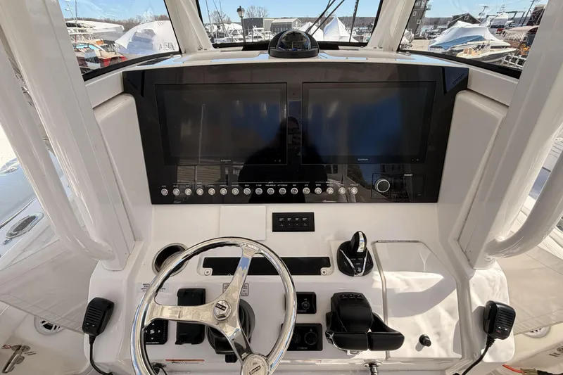 Slide: The Image of 2022 Regulator 28 Forward Seating boat with Garmin electronics, interior view. - 12