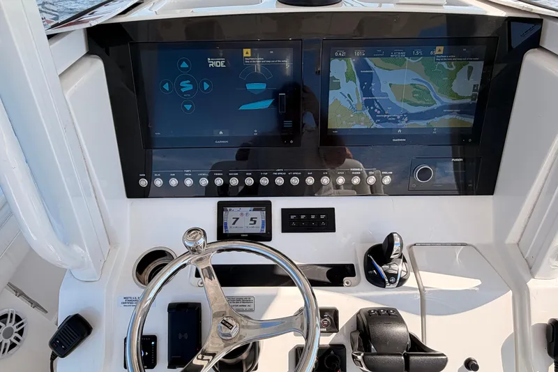 Slide: The Image of Regulator 28 boat console with Garmin displays, 2022 model. - 22