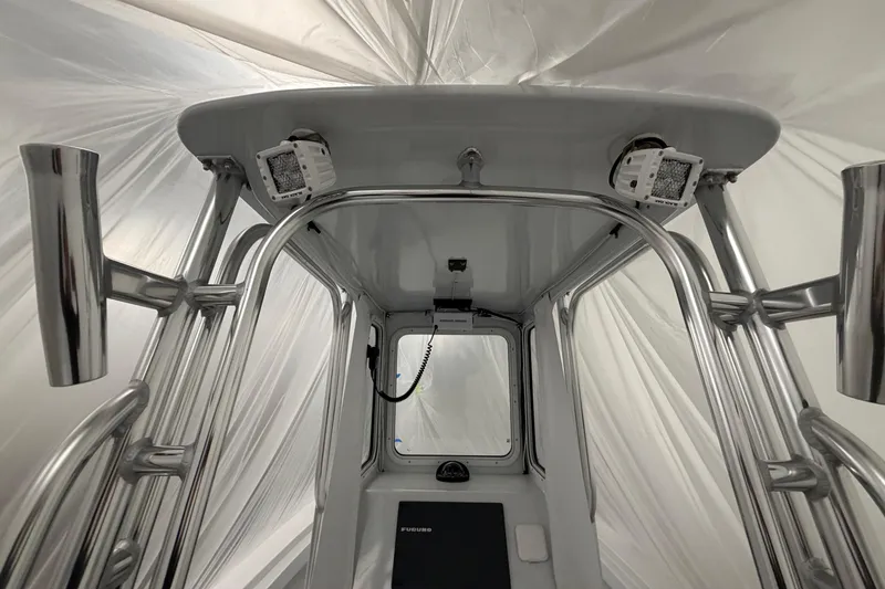 Slide: The Image of 1975 SeaCraft SC 23 Classic boat interior with stainless steel framework and modern equipment. - 11