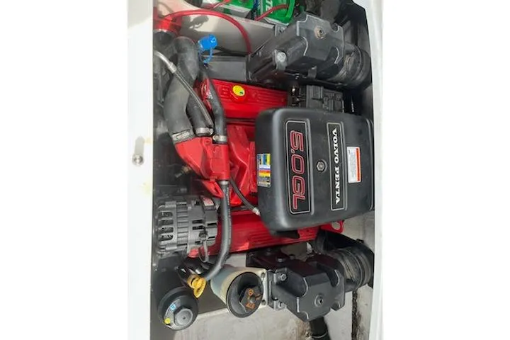 Slide: The Image of Engine of 2011 Crownline 21 SS boat, featuring Volvo Penta 5.0 GL components. - 6