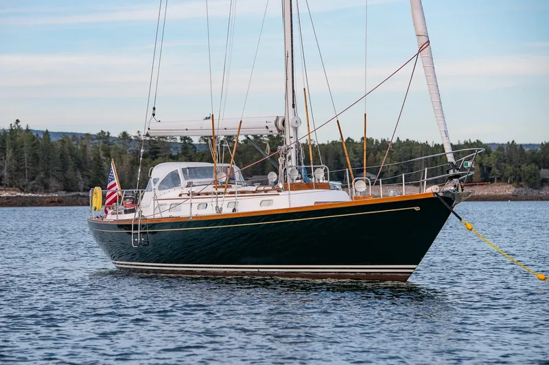 The Image of Hinckley Sou'wester 51 sailboat from 1989 anchored on calm water. - 0