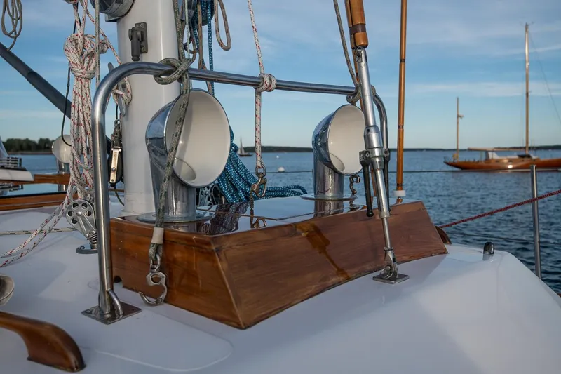 Slide: The Image of Hinckley Sou'wester 51 sailboat deck with rigging and fittings, 1989 model, on calm water. - 23