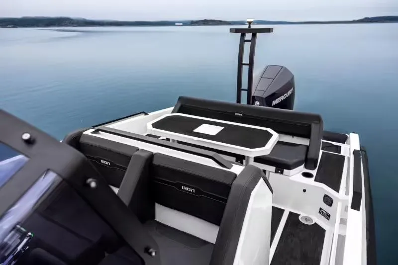 Slide: The Image of Manufacturer Provided Image: 2025 Iron 707 boat with sleek design on calm water. - 16