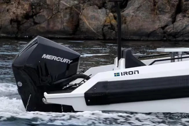 Slide: The Image of Manufacturer Provided Image: Iron 707 boat with Mercury engine, 2025 model, cruising near rocky shoreline. - 18