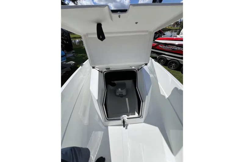 Slide: The Image of Open storage compartment on 2026 Iron 707 boat, showcasing spacious interior design. - 9