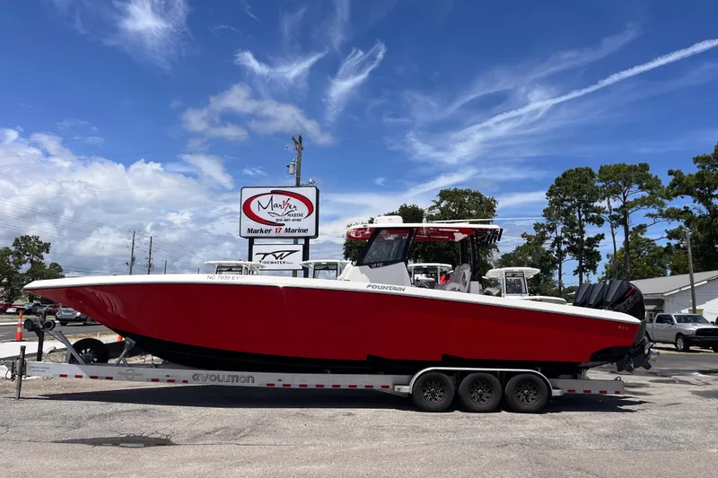 The Image of 2023 Fountain 38 Tournament Edition boat on trailer at Marker 17 Marine dealership. - 1