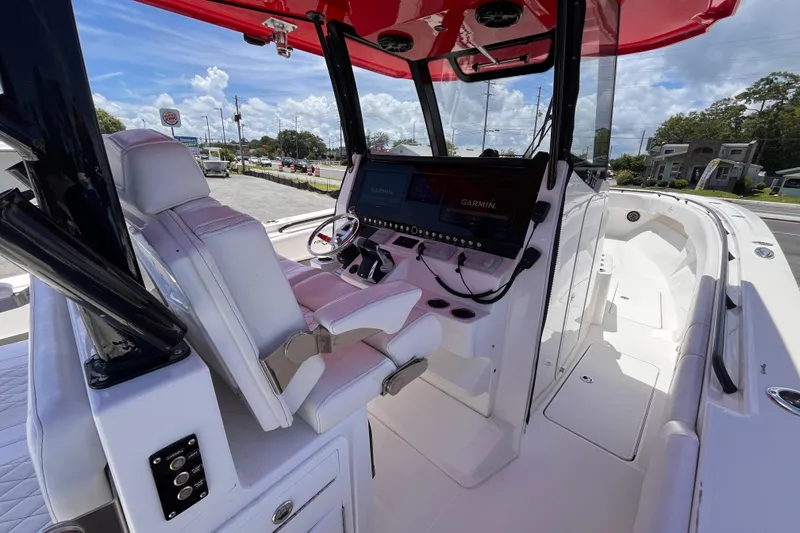 Slide: The Image of 2023 Fountain 38 Tournament Edition boat interior with advanced navigation system and seating. - 10