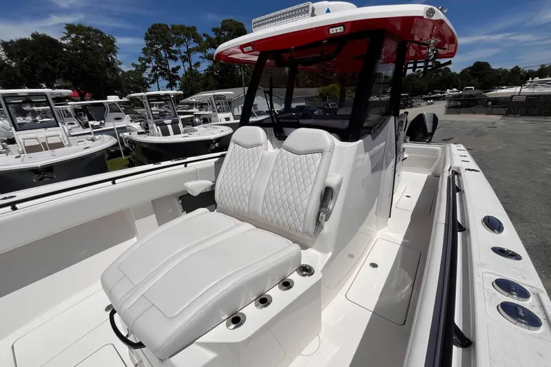 Slide: The Image of 2023 Fountain 38 Tournament Edition boat with luxurious seating and sleek design. - 19