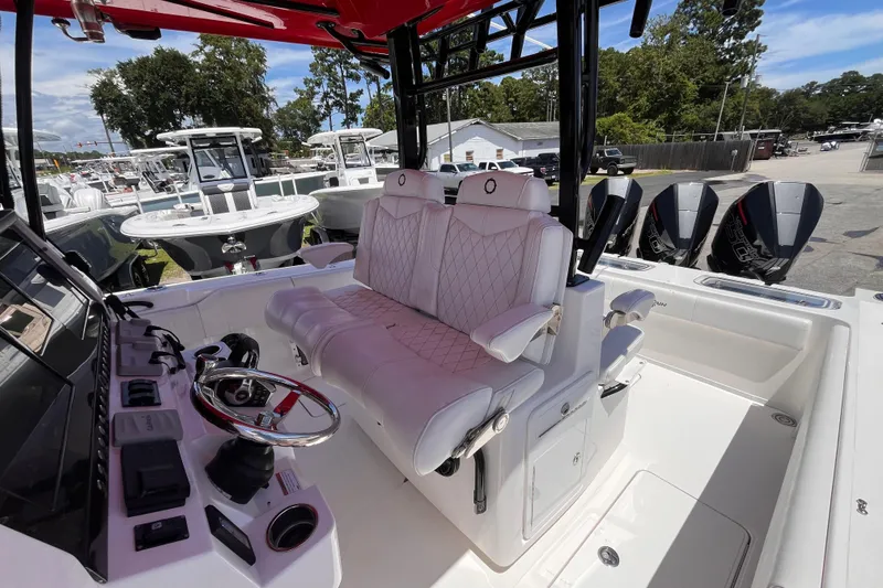 Slide: The Image of 2023 Fountain 38 Tournament Edition boat interior with luxurious seating and advanced controls. - 20