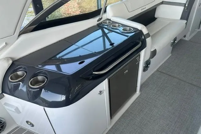 Slide: The Image of 2023 Formula 350 Crossover Bowrider I/O interior with sleek seating and modern amenities. - 4