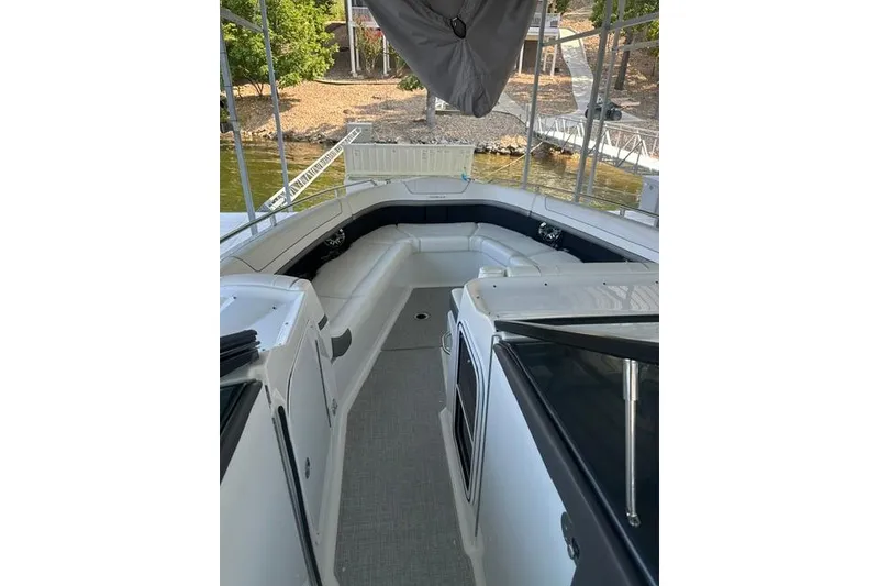 Slide: The Image of 2023 Formula 350 Crossover Bowrider I/O with spacious seating and sleek design. - 5