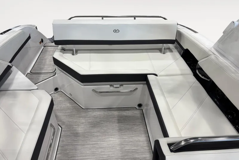 Slide: The Image of 2026 Cobalt R6 boat interior with sleek white seating and modern design. - 13