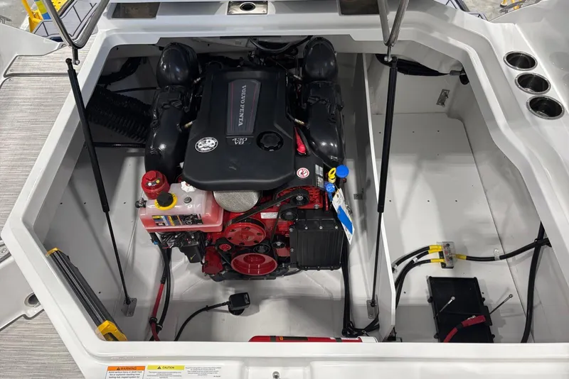 Slide: The Image of Engine compartment of a 2026 Cobalt R6 boat featuring a Volvo Penta 430 V8 engine. - 22