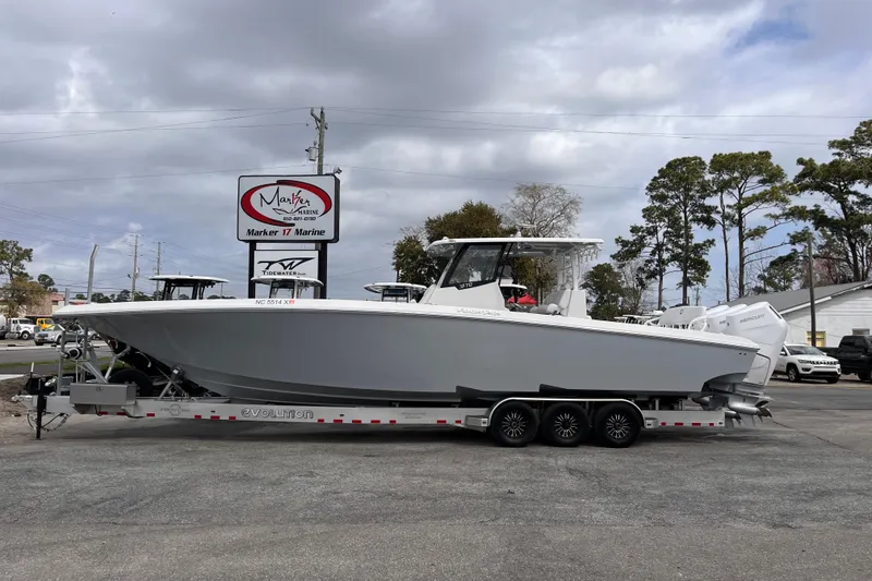 The Image of 2026 Fountain 38 Tournament Edition boat on trailer at Marker 17 Marine dealership. - 1