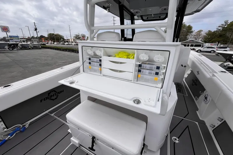 Slide: The Image of 2026 Fountain 38 Tournament Edition boat with organized fishing tackle station. - 10