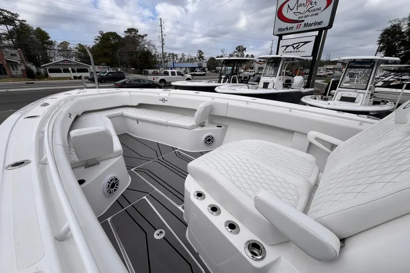 Slide: The Image of 2026 Fountain 38 Tournament Edition boat with luxurious white seating and modern design. - 17