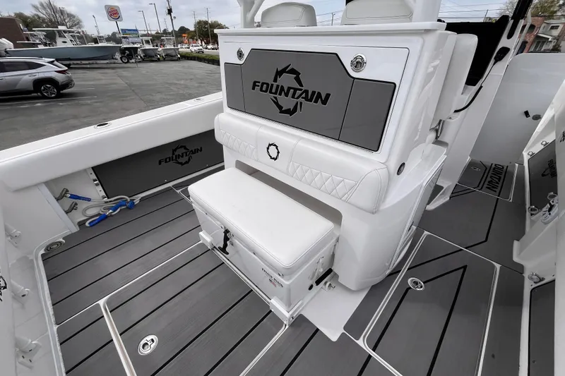 Slide: The Image of 2026 Fountain 38 Tournament Edition boat interior with seating and storage. - 9