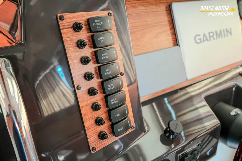 Slide: The Image of Control panel of 2024 Ranger Tugs R-27 boat with Garmin navigation system. - 66