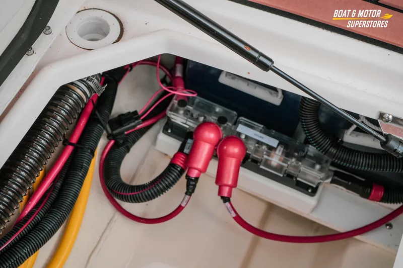 Slide: The Image of Electrical wiring and components inside a 2024 Ranger Tugs R-27 boat. - 74