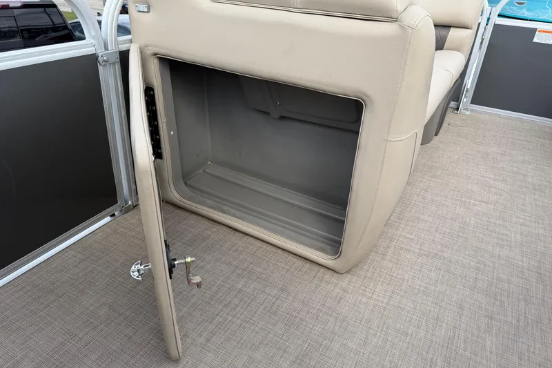 Slide: The Image of Open storage compartment on 2022 Sun Tracker Party Barge 20 DLX pontoon boat. - 8