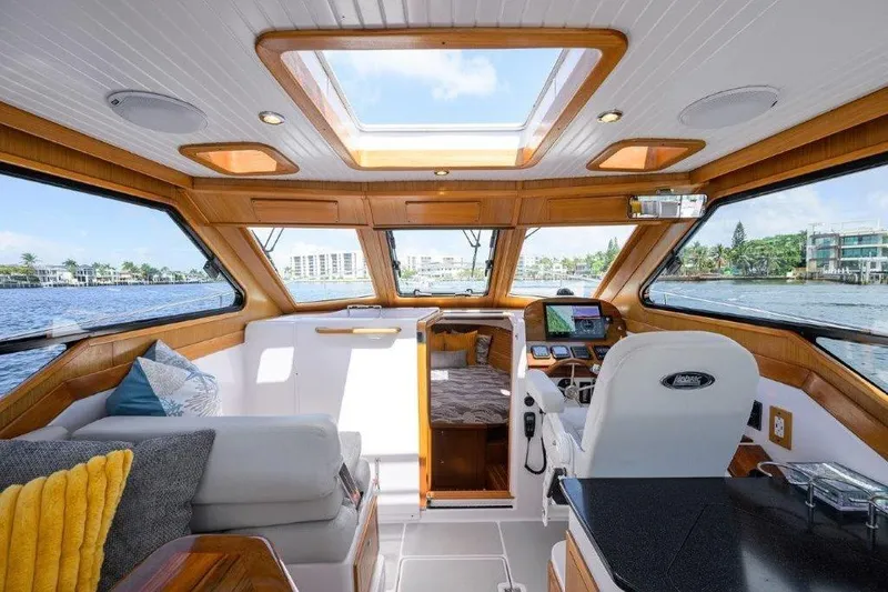 Slide: The Image of Luxurious interior of 2022 True North 34 yacht with panoramic windows and modern amenities. - 68
