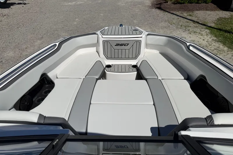 Slide: The Image of 2023 Yamaha Boats AR250 interior with spacious seating and modern design. - 19