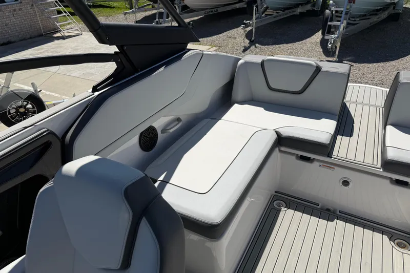 Slide: The Image of 2023 Yamaha Boats AR250 interior seating with sleek design and modern upholstery. - 32