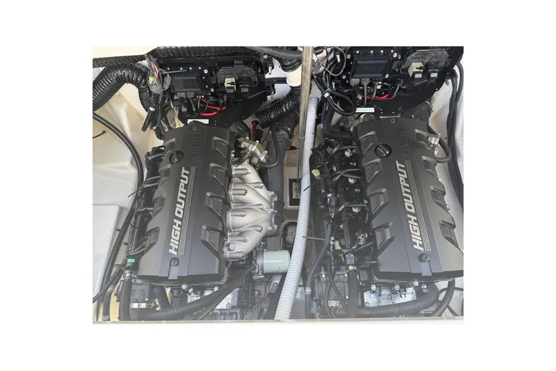 Slide: The Image of 2023 Yamaha AR250 boat engine compartment with high output engines. - 35